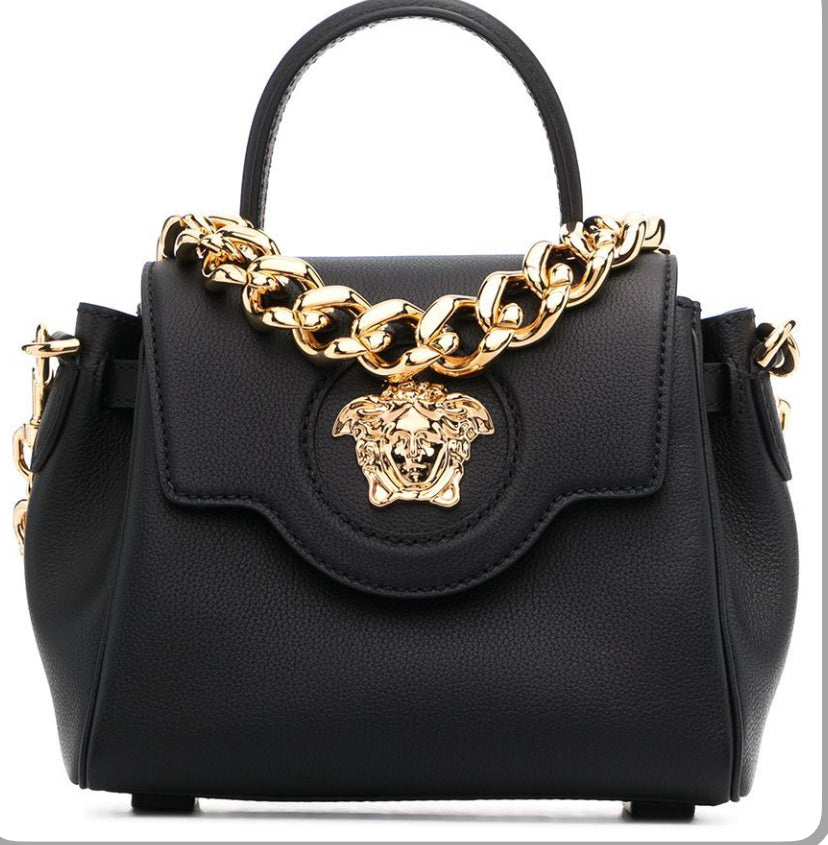 black leather Medusa plaque detail foldover top single rounded top handle internal slip pocket gold-tone hardware adjustable-length chain See